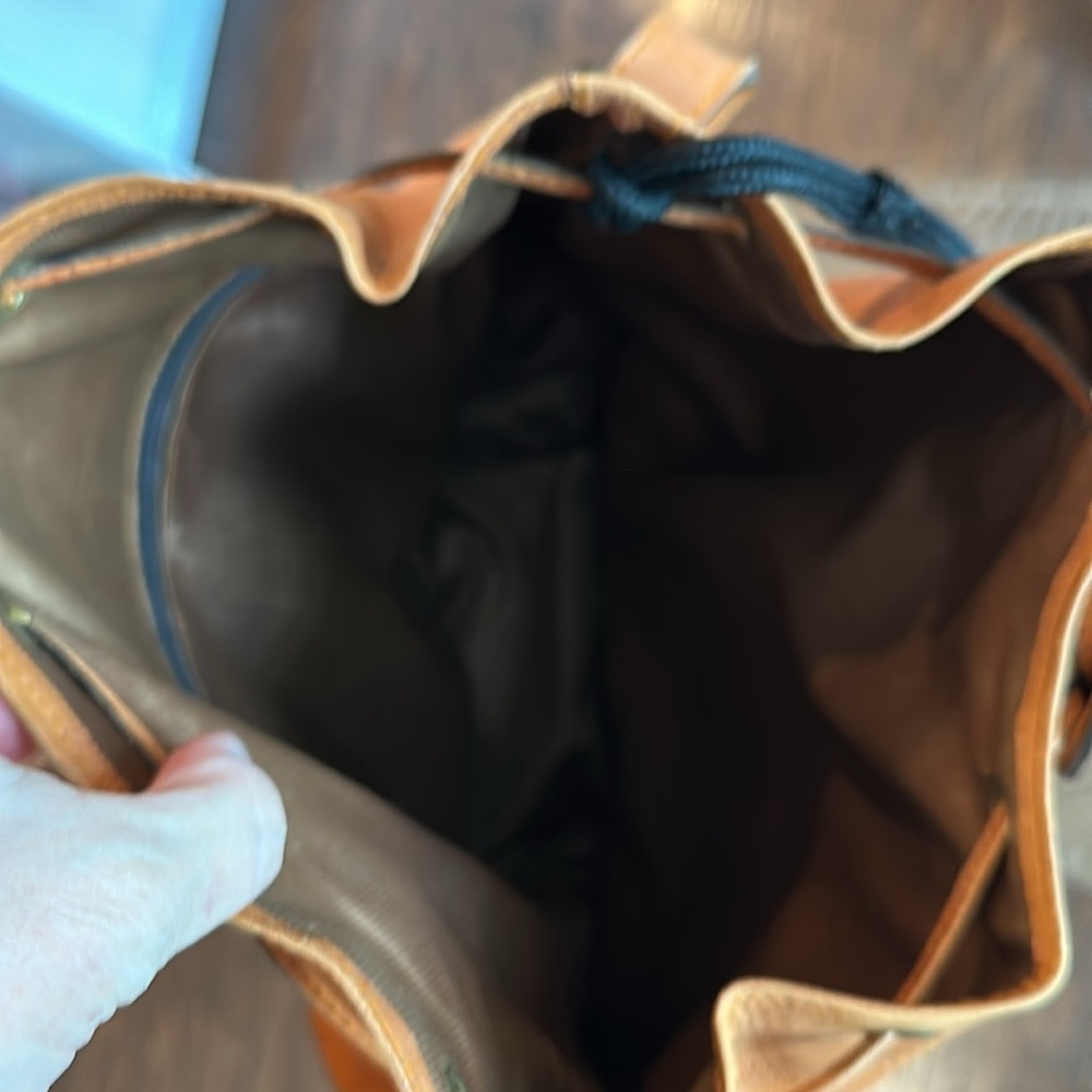 Genuine leather cognac colored bucket shoulder bag with cinch close. - Picture 4 of 5